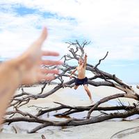 Hold hand out to jumping guy