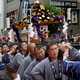 japanese-people-carrying-a-shrine