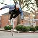 man-doing-jump-trick-on-skateboard