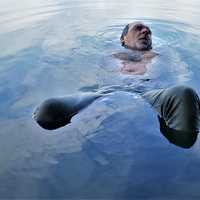 Man immersed in water