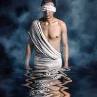 man-in-robes-in-the-water