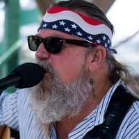 man-singing-with-patriotic-headband-free-stock-photo