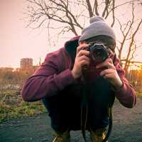 Man Taking Photo with Camera