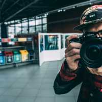 man-taking-photos-with-camera