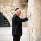 Mike Pence praying on the pray wall