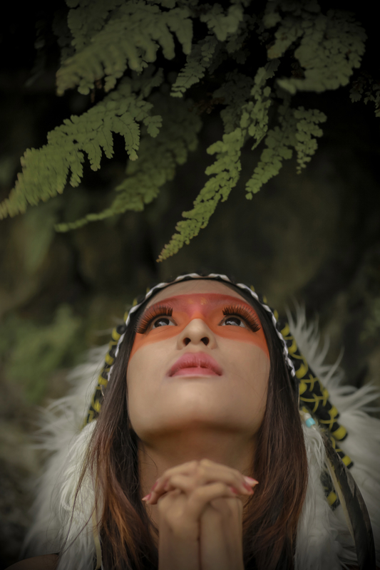 native american girl looking  up  and praying  image Free 