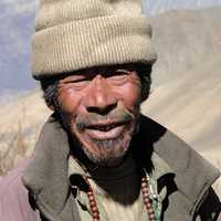 old-man-in-nepal-with-a-weather-beaten-face