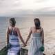 BALI, INDONESIA - JANUARY 22, 2018: Two young women friends on t