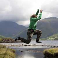 person-jumping-over-the-landscape