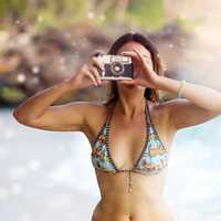 pretty-woman-taking-photo-in-bikini