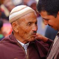 son-talking-to-father-on-the-street