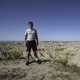 Standing on the edge of a cliff at Badlands National Park