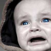 teardrop-from-crying-baby-with-blue-eyes