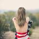 woman-back-wrapped-in-american-flag