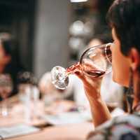 woman-drinking-wine-in-a-glass