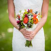 woman-in-a-white-dress-with-bouquet-of-flowers