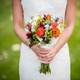 woman-in-a-white-dress-with-bouquet-of-flowers