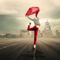 woman-leaping-holding-a-red-scarlet-a-red-scarf-for-joy