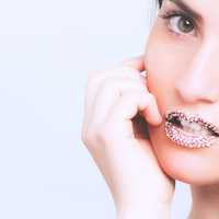woman-model-with-beads-on-lips