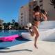woman-playing-with-soccer-ball-at-a-resort