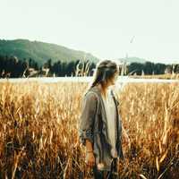 woman-walking-in-the-fields