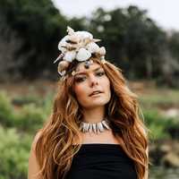 woman-with-a-hat-of-seashells-on-head