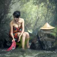 women-at-the-river-washing-clothes