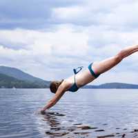 women-diving-into-water