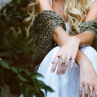 Women's hands with rings on them