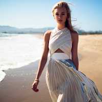 women-in-white-dress-walking-along-beach