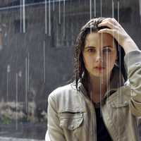women-standing-in-the-rain