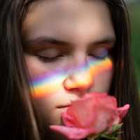 young-girl-face-with-rainbow-on-it