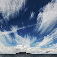Clouds and Sky with an Island in lake Titicaca in Peru