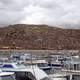 Puno cityscape and marina on Lake Titicaca in Peru