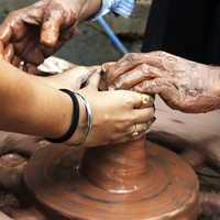 Hands Making Pottery