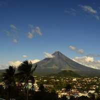 Mountain rising above the landscape of the town in the Philippines