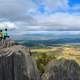 Standing on Mount Capistrano looking out at the landscape in the Philippines