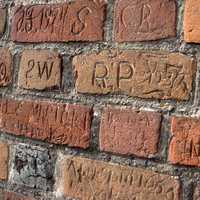 Inscriptions carved on the walls of St. Bartholomew's Church, Konin