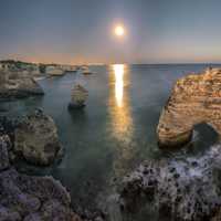 Sunset on the rocky cliffs and shoreline in Portugal