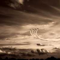 Three airplanes dancing in the sky