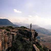 Person overlooking the landscape at Mkhomazi Wilderness area, South Africa