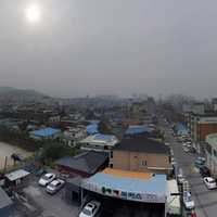 Cityscape under grey skies in Asan, South Korea