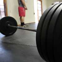 Barbell on Gym Floor