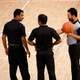 Basketball Referees on the court