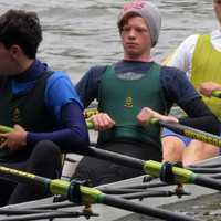 Boys in a team rowing
