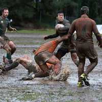 Muddy Rugby Players