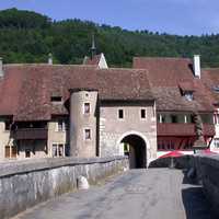 Bridge and buildings in  Saint-Ursanne, Switzerland