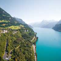 Mountains, river, landscape, town, and forest in Morschach, Switzerland