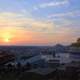 Buddha watching over the city at sunset in Thailand