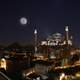 Night Cityscape in Istanbul, Turkey with moon and the Hagia Sophia